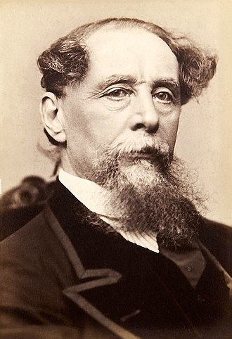 Charles Dickens má bradu a strapaté vlasy